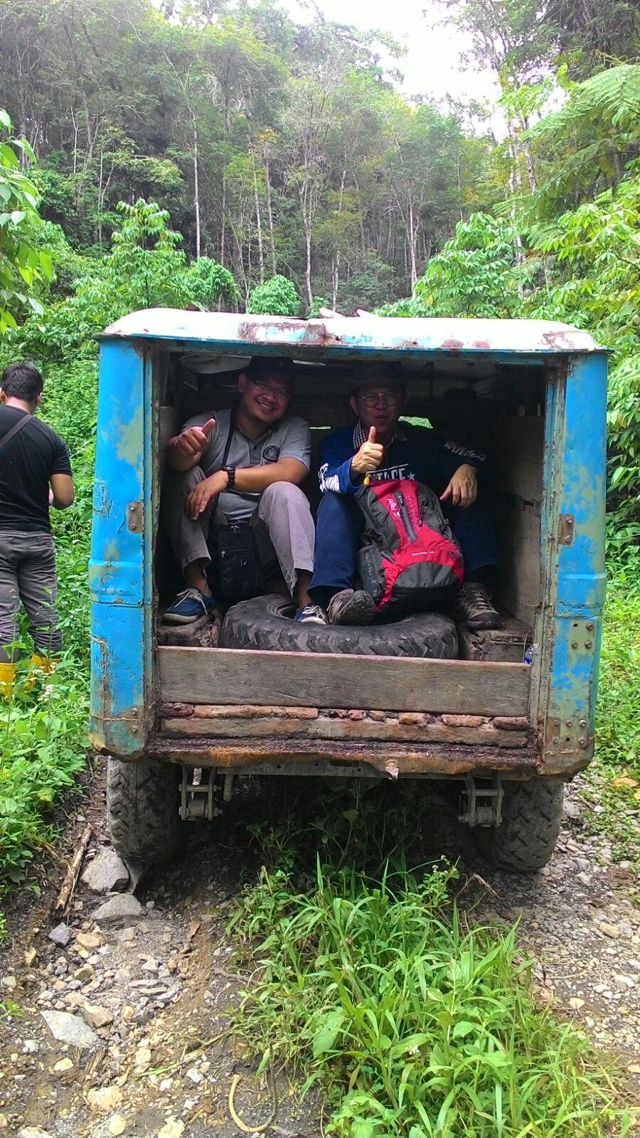 LHE field team travelling through a project survey area